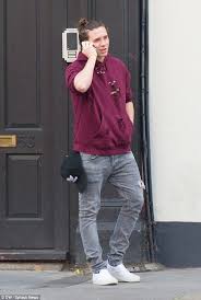 Black And White Slip On Vans Outfits Brooklyn Beckham Works Up A Sweat In London Skate Park Super Skinny Jeans Men Brooklyn Beckham Hoodie Outfit Men