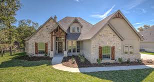 Between them is a bright and cozy family room with a wall of windows viewing the rear covered porch and a half wall looking into the adjacent kitch. Tilson Homes Floor Plans Luxury Tilson Homes Floor Plans New Home Plans Design