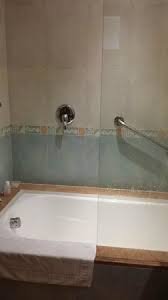 As mentioned above, there is no standard thickness and a variety of factors play into what drives the thickness used. Bath Shower Controls And Drain Here At Far Right Glass Wall On Half Of Bathtub Picture Of Iberostar Selection Paraiso Lindo Playa Paraiso Tripadvisor