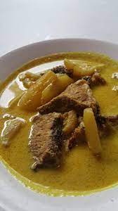 Kuih sopang dihidangkan dengan kuah santan pekat. 8 Makanan Tradisional Negeri Sembilan Yang Wajib Anda Cuba Dijamin Enak Saji My