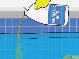 The ideal ratio of water to muriatic acid is 10:1. 4 Ways To Lower Swimming Pool Ph Wikihow