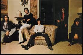 British singer mick jagger, wearing a suit and a cap, leaning on a music shop window, gasparini, in venice 1971. Rolling Stones In Exile