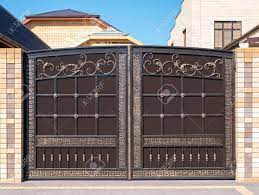 This 20′ dual swing deer gate was designed to rust to a fine purple patina. The Facade Of The House Modern Iron Gate With Wrought Iron Decor Stock Photo Picture And Royalty Free Image Image 138808669