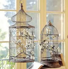 White bird cage decorated wire metal shabby cottage chic bird cage who loves pearls and all things beautiful? Bird Cage Decorating Ideas Cages And Aviaries Decorative Bird Cage Decor Vintage Bird Cage Decor Vintage Bird Cage