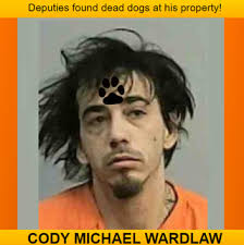 CODY MICHAEL WARDLAW arrested for animal cruelty after dead dogs were found  at his home