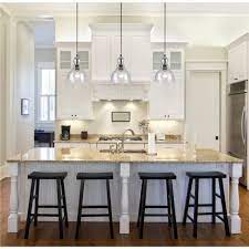 Light your kitchen dining table or kitchen island. 23 Pendant Light Ideas For Kitchen Island Astonishing Glass Kitchen Pendant Lighting Over Marble Top Table With Attached Sink Also Black Wooden Stools