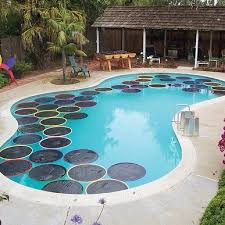 North American Fine Properties On Instagram Lilypad Pool Warmers Using A Hula Hoop And Some Cheap Black Plastic Diy Hinterhof Diy Pool Ideen Hintergarten