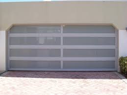 Garage Door With Perforated Mesh Windows Doors Garage Puertas Ventanas Tormenteras Shutters Caribbeandesi In 2020 Main Entrance Door Garage Doors Main Entrance