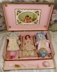 What is the best way to store porcelain dolls? Marvelous Antique Presentation Box With Doll Dresses Hats And Accessories From Ca 1900 From Stairway To T Antique Porcelain Dolls Antique Dolls Vintage Dolls