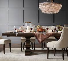 It has a washed gray taupe finish, and comes. Banks Extending Dining Table Pottery Barn