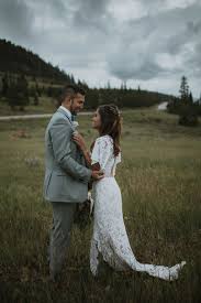 Moody Mountain Wedding Vibes Fun Floral Pops Wedding Forrest Bohemian Bride Flowing Wedding Dresses
