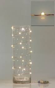 25 Gorgeous Ways To Use Christmas Lights Making Lemonade Fairy Lights Diy Wire Fairy Lights Lighted Centerpieces