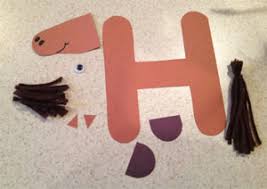 Colored popsicle sticks · popsicle sticks · brown and yellow acrylic paint · hot glue · poms · paint . Letter H Horse Craft All Kids Network