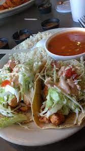 In a small bowl, whisk together oil, lime juice, chili powder, paprika, cumin and garlic powder. California Fish Grill For Lunch Today Seafood Recipes Grilled Fish Tacos Lunch