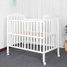 A baby lying on an elevated mattress in an infant bed with traditional crib bumpers placing a child into an infant bed can put strain on a caretaker's back as they typically have a mass between 11.8 kilograms (26 lb) 15 and 16.8 kilograms (37 lb) 16 at 36 months of age. China New Zealand Imported Pine Wood Paintless Newborn Swing Multifunctional Portable Baby Bed Baby Bed Mattress Baby Bed China Baby Cot Design Cot Bumper Baby