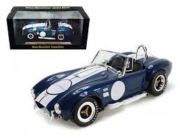 These would be the only gold cards. 1965 Shelby Cobra 427 S C Blue With Printed Carroll Shelby Signature 1 18 Diecast Model Car By Shelby Collectibles Walmart Com Walmart Com