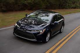 Toyota corroal width with and without mirrors : 2021 Toyota Corolla Sedan Review Trims Specs Price New Interior Features Exterior Design And Specifications Carbuzz