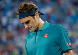 White tee with binary blue shorts with uni red logos for day session. Roger Federer Withdraws From 2021 Western Southern Open