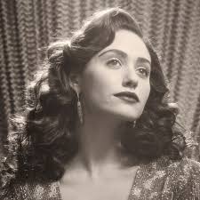 Who wrote “Slow Me Down” by Emmy Rossum?