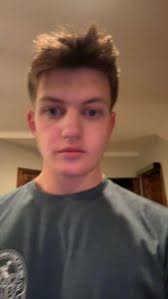 Senior Sean Stiles and junior Riley Shegos represent student body to the  Board of Education