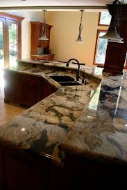 The Granite Gurus Spectrus Granite Kitchen From Mgs By Design Unique Kitchen Countertops Granite Kitchen Small Cottage Kitchen