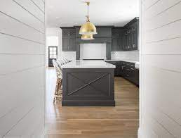 You might think that the black cabinets take away the airiness. Hot New Kitchen Trend Dark Cabinets Subway Tile Shiplap Home Bunch Interior Design Ideas