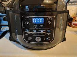 Place the chicken on the bottom of the pot. Ninja Foodi Pressure Cooker Review The Gadgeteer