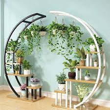 We are big fans of the footstool, not only because you can sit down at the end of the day and put your feet up on them, but you can also place a tray on they bring a feeling of comfort and relaxation into a living room and also provide an opportunity to cover in a favourite fabric. Amazon Com New Living Room Home Flower Shelf Multi Story Indoor Space Balcony Decorative Shelf Iron Flower Garden Rack House Plants Decor House Plants Indoor