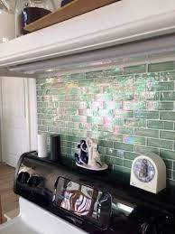 From atlantis leaf blue glossy and iridescent glass tile to april shower silver glossy & iridescent glass tile, and more, there are countless choices to meet your project requirements. 1x3 Inch Green Iridescent Glass Subway Tile Glass Subway Tile Iridescent Tile Backsplash Bathroom Wall Tile
