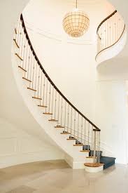 Capiz shells is one of the leading exporter of capiz shell products like chandeliers,tiles,jewelry and more. Winding Staircase With Capiz Shell Pendant Transitional Entrance Foyer
