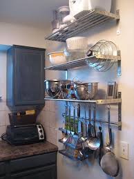 House Crashing The Tricked Out Townhouse Small Kitchen Storage Small Kitchen Organization Kitchen Storage
