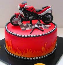 Stripes on top tier are made to look like tire tread (she noticed right away!). Motor Cake Cakesdecor Motorcycle Birthday Cakes Motor Cake Bike Cakes