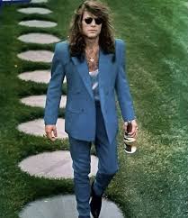 Jon Bon Jovi on his wedding day, 1989—rocking a blue suit, sunglasses, and  signature rockstar attitude." ❤️😍 | Facebook