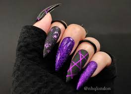 Are you feeling brave enough to we love this alternating orange, purple and black design, especially the black cat on the ring finger. Spellbound Nhq London