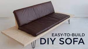 Additionally, the use of 4x8s instead of 2x4s, coupled with the grey stain, gives it an impressive first impression. Easy To Build Diy Sofa Youtube