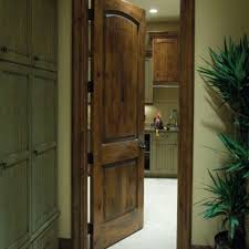 Interior wood doors made from the finest wood create a unique look in any home. Krosswood Doors 28 In X 80 In Rustic Knotty Alder 2 Panel Top Rail Arch Solid Core Wood Stainable Interior Door Slab Ae 1212880slb The Home Depot