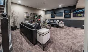 The Basement In This New Home Is The Perfect Place To Host A Party Or Watch A Game The Extra Living Space Is Ideal For Entertaini New Homes Home Builders Home