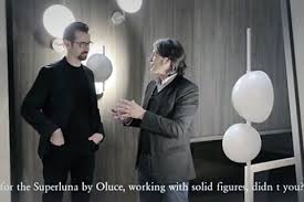 Floor lamp with indirect and reflected light and two rotating half spheres, to direct the light, in opaque white. Victor Vasilev Introduces Superluna Oluce