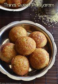 Me too joined the club of sirudhaniyam / millets foxtail millet honey balls recipe also called as thenum thinai maavum in tamil that is offered as prasad to lord murugan, also an easy to make snack. Thinai Sweet Kuzhi Paniyaram Foxtail Millet Paniyaram Recipe Sharmis Passions