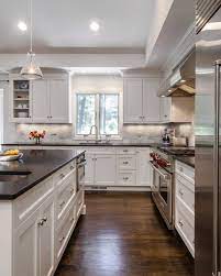 The difference is that it has a greyish or yellowish undertone. White Kitchen Black Granite Houzz