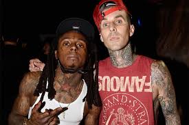 If you are a big travis barker fan: Travis Barker Drops Gimme Brain With Lil Wayne Rick Ross Rap Up