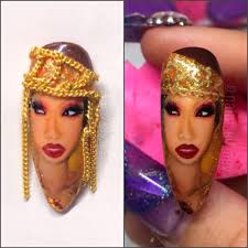 Cardi B-inspired nail art with chain detail?