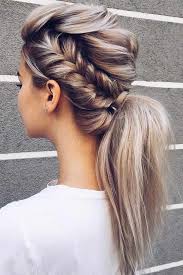 This unique hairstyle features fiery red curls loosely tied into a long ponytail. 39 Totally Trendy Prom Hairstyles For 2021 To Look Gorgeous Braided Ponytail Hairstyles Prom Ponytail Hairstyles Wedding Hairstyles For Long Hair