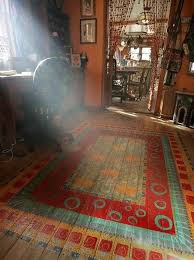 Porch painted rug on deck. Top 10 Stencil And Painted Rug Ideas For Wood Floors
