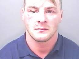 Axeman bursts into wake, demands barmaid kisses him and pulls a knife