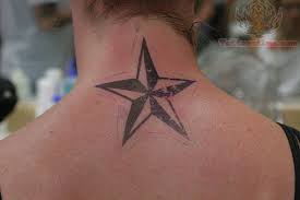 Stars are amazing both in the sky and on the neck, blazing in tattoo form. 24 Back Neck Tattoos For Men