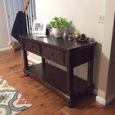 The skempton counter height table and bar stool set invites you to raise the bar on small space living. Porter Sofa Console Table Ashley Furniture Homestore