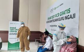 Nu Care Dan Tokopedia Gelar Swab Test Pcr Untuk Guru Ngaji Kabar24 Bisnis Com