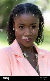 Close up portrait of a beautiful woman outside smiling Stock Photo