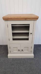 This record player cabinet has a cool, modern style and adds an extra layer of protection thanks to the full door. Bespoke Painted Record Player Hifi Cabinet Edmunds And Clarke Furniture